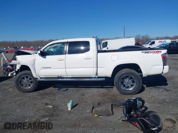 2021 Toyota Tacoma 4WD SR5 with VIN 3TYDZ5BN4MT000619, listed as a IAAI auction lot 41886686 with 91,338 mi miles. Bid and sale history available at carsss.com. Image 13.