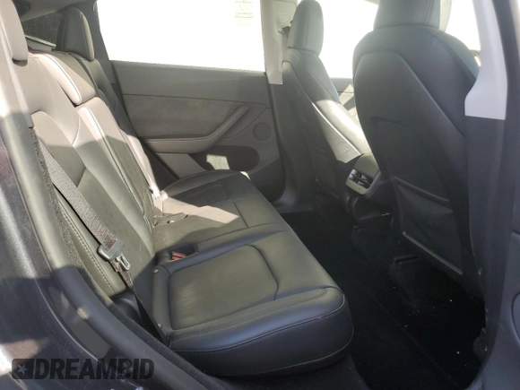 2024 Tesla Model Y Long Range with VIN 7SAYGDEE2RA252101, listed as a Copart auction lot 49514675 with 19,399 mi miles and Salvage Title. Bid and sale history available at DreamBid. Image 10.