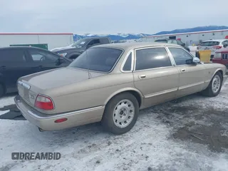 2000 Jaguar XJ Vanden Plas with VIN SAJDA24C7YLF13906, listed as a IAAI auction lot 41559262 with 122,586 mi miles and . Bid and sale history available at DreamBid. Image 4.