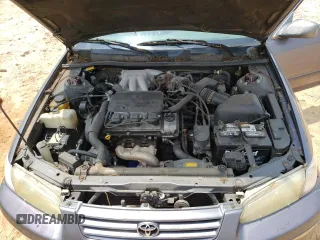 1999 Toyota Camry LE z VIN JT2BF22K5X0208248, wystawiony jako Copart lot #59916165 z przebiegiem 329 883 mil mil oraz Szkoda całkowita • Salvage title. Historia ofert i sprzedaży dostępna na DreamBid. Obrazek 11.