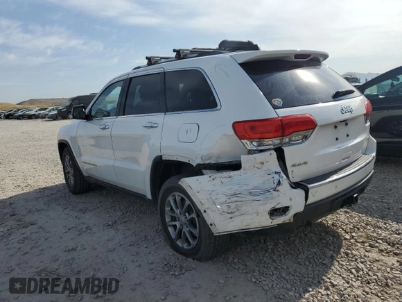 2014 Jeep Grand Cherokee Limited with VIN 1C4RJFBG4EC299273, listed as a Copart auction lot 59660695 with 162,528 mi miles and Salvage title. Bid and sale history available at DreamBid. Image 2.
