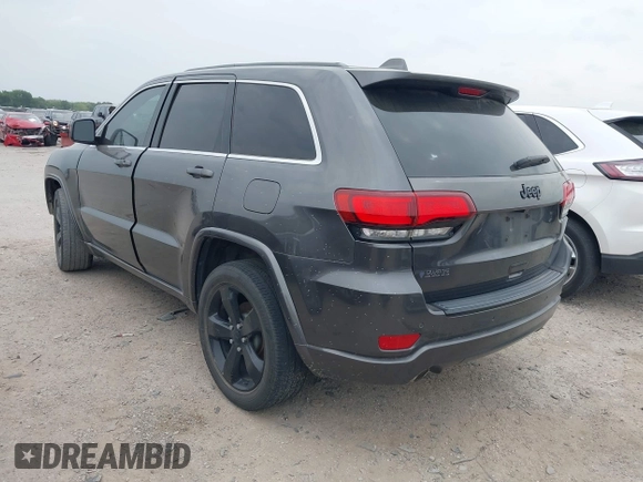 2015 Jeep Grand Cherokee Altitude with VIN 1C4RJEAG3FC219782, listed as a IAAI auction lot 42076212 with 194,910 mi miles. Bid and sale history available at carsss.com. Image 3.