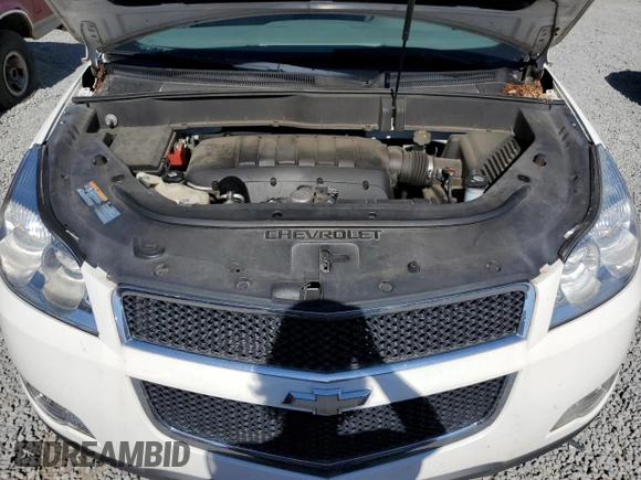 2012 Chevrolet Traverse 1LT z VIN 1GNKVGED0CJ207833, wystawiony jako Copart lot #58083155 z przebiegiem 120 058 mil mil oraz Szkoda całkowita • Salvage title. Historia ofert i sprzedaży dostępna na DreamBid. Obrazek 12.