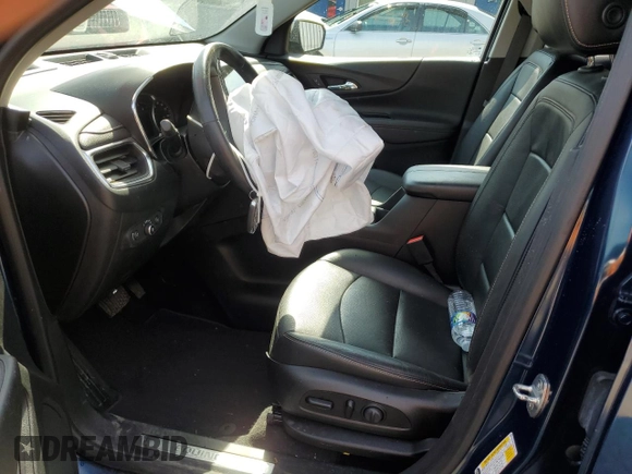 2021 Chevrolet Equinox Premier z VIN 2GNAXXEV9M6115343, wystawiony jako Copart lot #56357955 z przebiegiem 75 439 mil mil oraz Szkoda całkowita • Salvage title. Historia ofert i sprzedaży dostępna na DreamBid. Obrazek 7.