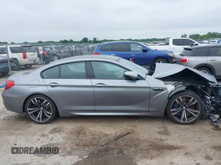 2014 BMW M6 with VIN WBS6C9C54EDV73926, listed as a IAAI auction lot 42421586 with 82,216 mi miles and . Bid and sale history available at DreamBid. Image 14.