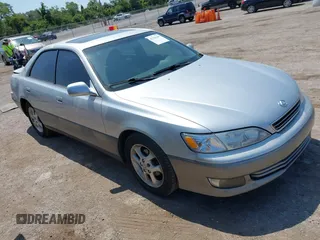 2001 Lexus ES 300 z VIN JT8BF28GX10307910, wystawiony jako IAAI lot #42326385 z przebiegiem 157 130 mil mil oraz . Historia ofert i sprzedaży dostępna na DreamBid. Obrazek 1.