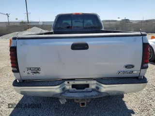 2001 Ford F-150 XL with VIN 1FTRX17W11NA24623, listed as a Copart auction lot 56767345 with 201,959 mi miles and Salvage title. Bid and sale history available at DreamBid. Image 6.