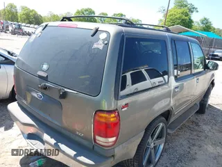 2000 Ford Explorer XLT with VIN 1FMZU63E0YZC65266, listed as a IAAI auction lot 42004786 with 273,397 mi miles and . Bid and sale history available at DreamBid. Image 4.
