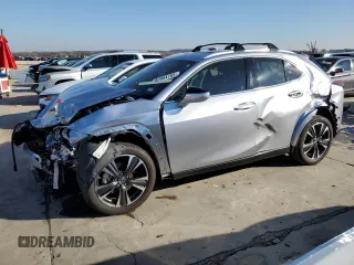 2023 Lexus UX 250h Premium z VIN JTHP6JBH6P2159687, wystawiony jako Copart lot #82954783 z przebiegiem 2 669 mil mil oraz . Historia ofert i sprzedaży dostępna na DreamBid. Obrazek 1.