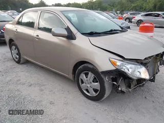 2009 Toyota Corolla with VIN 2T1BU40E69C137608, listed as a IAAI auction lot 42595416 with 290,492 mi miles and . Bid and sale history available at DreamBid. Image 1.