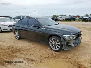 2018 BMW 3 Series 320i with VIN WBA8A9C56JAH12021, listed as a Copart auction lot 58971175 with 100,317 mi miles and Salvage title. Bid and sale history available at DreamBid. Image 4.