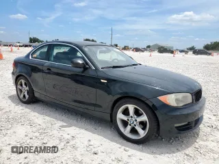 2011 BMW 1 Series 128i with VIN WBAUP7C5XBVM54479, listed as a Copart auction lot 66010505 with 133,535 mi miles and Clean title. Bid and sale history available at DreamBid. Image 4.