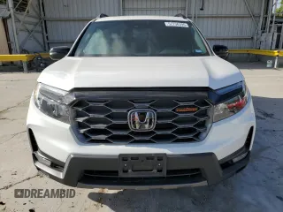 2023 Honda Passport TrailSport with VIN 5FNYF8H6XPB026464, listed as a Copart auction lot 52736395 with 14,281 mi miles and Salvage title. Bid and sale history available at DreamBid. Image 5.