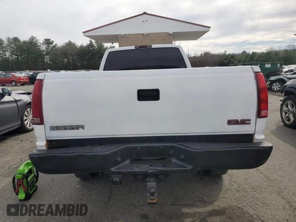 2000 GMC Sierra 1500 with VIN 1GTGC34R9YR154858, listed as a Copart auction lot 49158675 with 183,227 mi miles and Salvage Title. Bid and sale history available at DreamBid. Image 6.