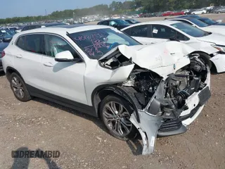 2022 BMW X2 sDrive28i with VIN WBXYH9C04N5U11829, listed as a IAAI auction lot 40184510 with 59,426 mi miles. Bid and sale history available at carsss.com. Image 1.