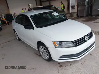 2015 Volkswagen Jetta SE z VIN 3VWD17AJ9FM271575, wystawiony jako IAAI lot #42198458 z przebiegiem 122 161 mil mil oraz . Historia ofert i sprzedaży dostępna na DreamBid. Obrazek 1.