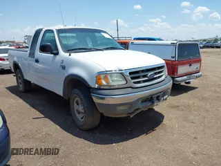 2002 Ford F-150 XL z VIN 2FTRX18W02CA22920, wystawiony jako IAAI lot #42426790 z przebiegiem 153 433 mil mil oraz . Historia ofert i sprzedaży dostępna na DreamBid. Obrazek 1.