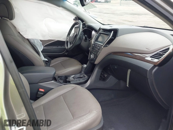 2017 Hyundai Santa Fe 2.4L with VIN 5NMZU3LB2HH014844, listed as a IAAI auction lot 42657624 with 93,533 mi miles and . Bid and sale history available at DreamBid. Image 5.