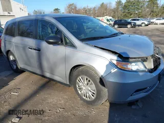 2014 Honda Odyssey LX with VIN 5FNRL5H24EB001131, listed as a IAAI auction lot 41753911 with 238,080 mi miles. Bid and sale history available at carsss.com. Image 1.