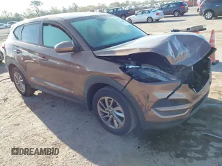 2017 Hyundai Tucson SE with VIN KM8J23A40HU525982, listed as a IAAI auction lot 41790898 with 107,715 mi miles. Bid and sale history available at carsss.com. Image 1.