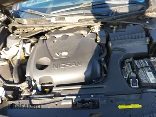 2016 Nissan Maxima SV z VIN 1N4AA6APXGC386974, wystawiony jako IAAI lot #41738932 z przebiegiem 132 395 mil mil oraz . Historia ofert i sprzedaży dostępna na DreamBid. Obrazek 10.