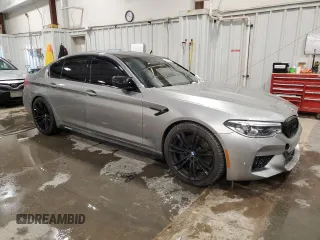 2019 BMW M5 with VIN WBSJF0C50KB447597, listed as a Copart auction lot 45179115 with 40,600 mi miles and Salvage Title. Bid and sale history available at carsss.com. Image 4.