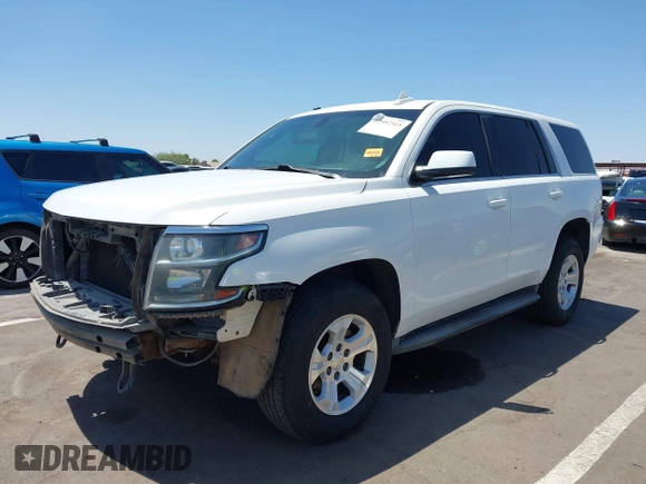 2015 Chevrolet Tahoe Commercial with VIN 1GNSK3EC9FR622941, listed as a IAAI auction lot 42592315 with 239,334 mi miles and . Bid and sale history available at DreamBid. Image 2.