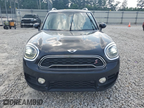 2017 MINI Countryman Cooper S with VIN WMZYT5C36H3D78964, listed as a Copart auction lot 59536135 with 129,258 mi miles and Salvage title. Bid and sale history available at DreamBid. Image 5.