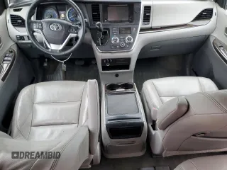2015 Toyota Sienna XLE с VIN 5TDYK3DC7FS571431, выставлен на аукционе Copart как лот 57173595 с пробегом 305 940 миль миль и Списание • Salvage title. История ставок и продаж доступна на DreamBid. Изображение 8.