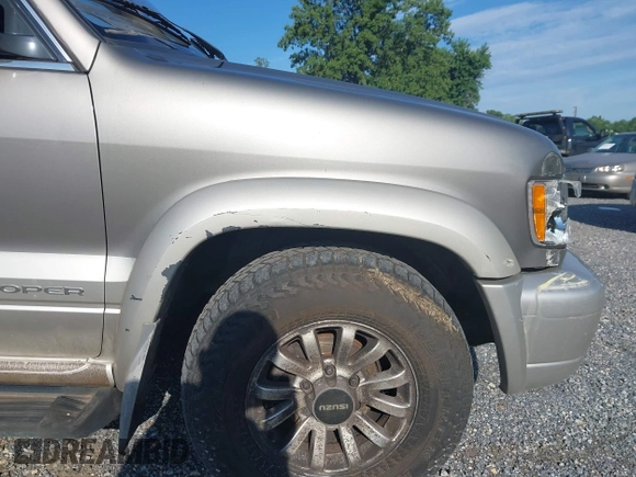 2000 Isuzu Trooper S with VIN JACDJ58X8Y7J10132, listed as a IAAI auction lot 42731475 with 161,020 mi miles and . Bid and sale history available at DreamBid. Image 16.