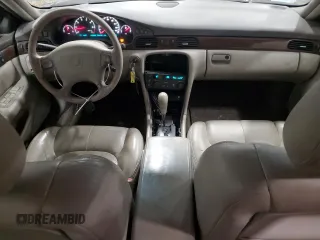 1998 Cadillac Seville STS z VIN 1G6KY5490WU916771, wystawiony jako Copart lot #58699555 z przebiegiem 129 944 mil mil oraz Nie do naprawy. Historia ofert i sprzedaży dostępna na DreamBid. Obrazek 8.