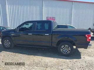 2019 Ford F-150 XL with VIN 1FTEW1C40KKD29930, listed as a IAAI auction lot 42006639 with 149,236 mi miles and . Bid and sale history available at DreamBid. Image 14.