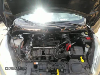2018 Ford Fiesta SE z VIN 3FADP4BJ6JM126135, wystawiony jako IAAI lot #42503766 z przebiegiem 14 836 mil mil oraz . Historia ofert i sprzedaży dostępna na DreamBid. Obrazek 10.