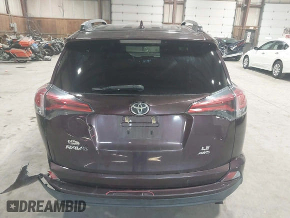 2018 Toyota RAV4 LE with VIN 2T3BFREV0JW759714, listed as a IAAI auction lot 41823084 with 119,909 mi miles and . Bid and sale history available at DreamBid. Image 16.