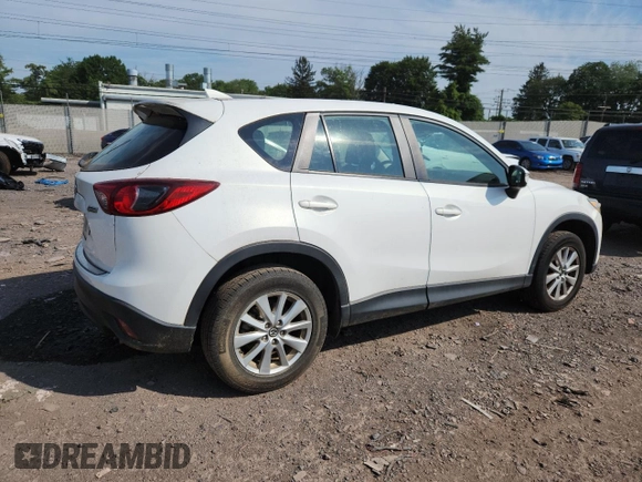 2016 Mazda CX-5 Sport with VIN JM3KE4BYXG0704194, listed as a Copart auction lot 62095735 with 93,970 mi miles and Salvage title. Bid and sale history available at DreamBid. Image 3.