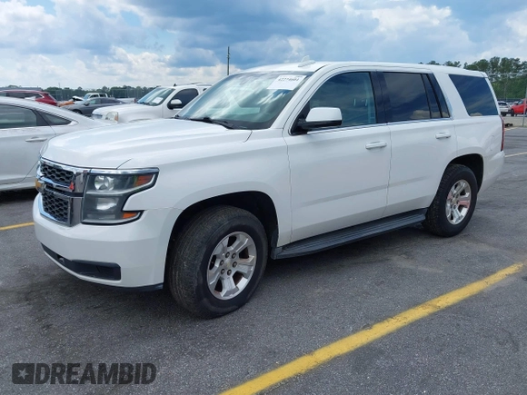 2015 Chevrolet Tahoe Commercial z VIN 1GNLC2EC1FR721538, wystawiony jako IAAI lot #42274601 z przebiegiem 138 991 mil mil oraz . Historia ofert i sprzedaży dostępna na DreamBid. Obrazek 20.