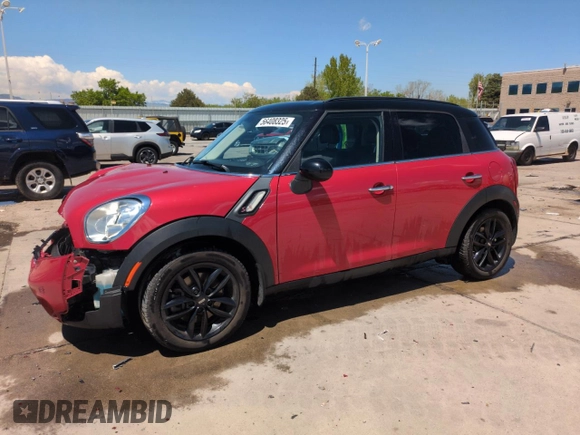 2015 MINI Countryman S with VIN WMWZC3C58FWT06695, listed as a Copart auction lot 56408325 with 99,673 mi miles and Salvage title. Bid and sale history available at DreamBid. Image 1.