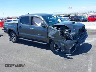 2018 Toyota Tacoma SR5 with VIN 3TMAZ5CN9JM069900, listed as a IAAI auction lot 42229953 with 86,328 mi miles and . Bid and sale history available at DreamBid. Image 1.