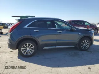2021 Cadillac XT4 AWD Premium Luxury with VIN 1GYFZDR47MF002175, listed as a Copart auction lot 48303665 with 94,698 mi miles and Salvage Title. Bid and sale history available at carsss.com. Image 3.