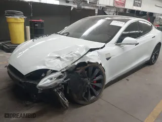 2014 Tesla Model S P85D with VIN 5YJSA1H23EFP63785, listed as a IAAI auction lot 41872168 with 118,248 mi miles. Bid and sale history available at carsss.com. Image 2.