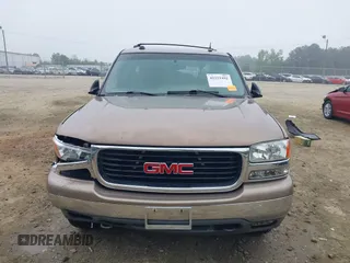 2004 GMC Yukon SLT z VIN 1GKEK13Z44R121720, wystawiony jako IAAI lot #42222492 z przebiegiem 263 216 mil mil oraz . Historia ofert i sprzedaży dostępna na DreamBid. Obrazek 11.