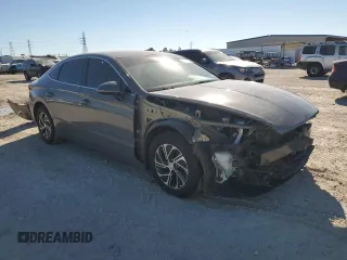 2022 Hyundai Sonata Hybrid Blue with VIN KMHL24JJ3NA041788, listed as a Copart auction lot 81148134 with 99,214 mi miles and Salvage Title. Bid and sale history available at carsss.com. Image 4.