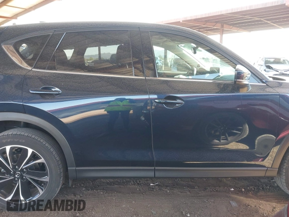 2023 Mazda CX-5 2.5 S Premium Plus Package with VIN JM3KFBEM3P0125736, listed as a IAAI auction lot 41578619 with 18,560 mi miles. Bid and sale history available at carsss.com. Image 13.