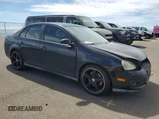 2009 Volkswagen Jetta GLI z VIN 3VWBJ71K19M071374, wystawiony jako Copart lot #77714284 z przebiegiem 61 434 mil mil oraz Szkoda całkowita • Salvage title. Historia ofert i sprzedaży dostępna na DreamBid. Obrazek 4.