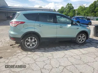 2013 Ford Escape SEL z VIN 1FMCU9H98DUC56048, wystawiony jako Copart lot #61613085 z przebiegiem 198 102 mil mil oraz Szkoda całkowita • Salvage title. Historia ofert i sprzedaży dostępna na DreamBid. Obrazek 3.
