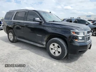 2015 Chevrolet Tahoe LT with VIN 1GNSKBKC0FR226220, listed as a Copart auction lot 59214125 with 260,330 mi miles and Salvage title. Bid and sale history available at DreamBid. Image 4.