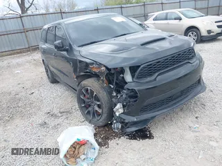 2021 Dodge Durango SRT Hellcat with VIN 1C4SDJH91MC682235, listed as a IAAI auction lot 42029380 with 9,921 mi miles and . Bid and sale history available at DreamBid. Image 1.