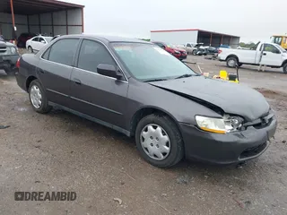 1999 Honda Accord LX z VIN 1HGCG5647XA154131, wystawiony jako IAAI lot #41962701 z przebiegiem 126 673 mil mil oraz . Historia ofert i sprzedaży dostępna na DreamBid. Obrazek 1.