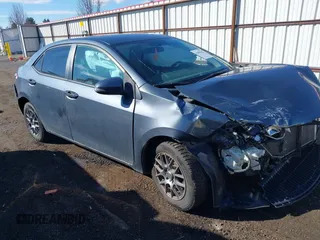 2014 Toyota Corolla L with VIN 5YFBURHE2EP040286, listed as a IAAI auction lot 41890115 with 154,584 mi miles and . Bid and sale history available at DreamBid. Image 1.