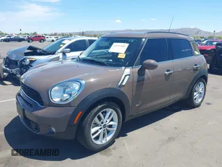 2013 MINI Countryman S ALL4 with VIN WMWZC5C54DWP34224, listed as a IAAI auction lot 42141400 with 33,307 mi miles and . Bid and sale history available at DreamBid. Image 2.